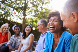 group of friends outside laughing